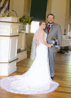 A bride and groom in Hopewell Church
